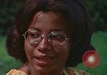 Image of female students and navy United States USA, 1975, second 58 stock footage video 65675046351