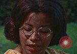 Image of female students and navy United States USA, 1975, second 62 stock footage video 65675046351