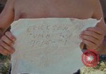 Image of people at beach Pacific Theater, 1945, second 3 stock footage video 65675046444