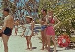 Image of people at beach Pacific Theater, 1945, second 6 stock footage video 65675046444
