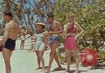 Image of people at beach Pacific Theater, 1945, second 7 stock footage video 65675046444