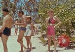 Image of people at beach Pacific Theater, 1945, second 8 stock footage video 65675046444