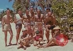 Image of people at beach Pacific Theater, 1945, second 22 stock footage video 65675046444