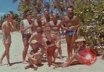 Image of people at beach Pacific Theater, 1945, second 23 stock footage video 65675046444