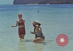 Image of people at beach Pacific Theater, 1945, second 30 stock footage video 65675046444