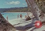 Image of people at beach Pacific Theater, 1945, second 35 stock footage video 65675046444