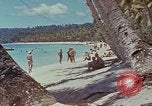 Image of people at beach Pacific Theater, 1945, second 36 stock footage video 65675046444