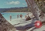 Image of people at beach Pacific Theater, 1945, second 37 stock footage video 65675046444