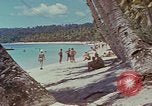 Image of people at beach Pacific Theater, 1945, second 38 stock footage video 65675046444