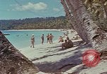 Image of people at beach Pacific Theater, 1945, second 39 stock footage video 65675046444