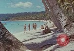 Image of people at beach Pacific Theater, 1945, second 40 stock footage video 65675046444