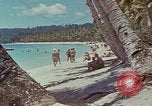 Image of people at beach Pacific Theater, 1945, second 41 stock footage video 65675046444