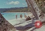 Image of people at beach Pacific Theater, 1945, second 43 stock footage video 65675046444