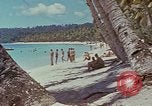 Image of people at beach Pacific Theater, 1945, second 45 stock footage video 65675046444
