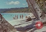 Image of people at beach Pacific Theater, 1945, second 48 stock footage video 65675046444