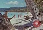 Image of people at beach Pacific Theater, 1945, second 50 stock footage video 65675046444