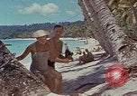 Image of people at beach Pacific Theater, 1945, second 51 stock footage video 65675046444