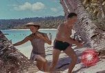 Image of people at beach Pacific Theater, 1945, second 52 stock footage video 65675046444