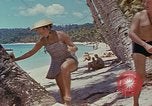 Image of people at beach Pacific Theater, 1945, second 53 stock footage video 65675046444