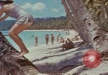 Image of people at beach Pacific Theater, 1945, second 55 stock footage video 65675046444
