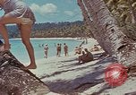 Image of people at beach Pacific Theater, 1945, second 56 stock footage video 65675046444