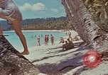 Image of people at beach Pacific Theater, 1945, second 57 stock footage video 65675046444