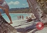 Image of people at beach Pacific Theater, 1945, second 58 stock footage video 65675046444