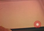 Image of Developing photographs in a dark room Pacific Theater, 1945, second 1 stock footage video 65675046450