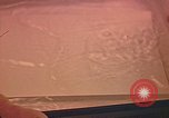 Image of Developing photographs in a dark room Pacific Theater, 1945, second 6 stock footage video 65675046450
