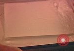 Image of Developing photographs in a dark room Pacific Theater, 1945, second 8 stock footage video 65675046450