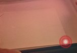 Image of Developing photographs in a dark room Pacific Theater, 1945, second 9 stock footage video 65675046450