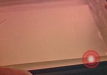 Image of Developing photographs in a dark room Pacific Theater, 1945, second 10 stock footage video 65675046450