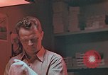 Image of Developing photographs in a dark room Pacific Theater, 1945, second 13 stock footage video 65675046450