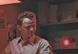 Image of Developing photographs in a dark room Pacific Theater, 1945, second 16 stock footage video 65675046450