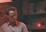 Image of Developing photographs in a dark room Pacific Theater, 1945, second 17 stock footage video 65675046450