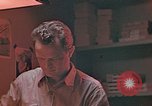 Image of Developing photographs in a dark room Pacific Theater, 1945, second 20 stock footage video 65675046450