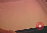 Image of Developing photographs in a dark room Pacific Theater, 1945, second 25 stock footage video 65675046450