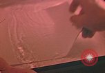 Image of Developing photographs in a dark room Pacific Theater, 1945, second 27 stock footage video 65675046450