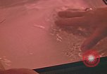 Image of Developing photographs in a dark room Pacific Theater, 1945, second 28 stock footage video 65675046450