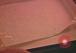 Image of Developing photographs in a dark room Pacific Theater, 1945, second 31 stock footage video 65675046450