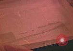 Image of Developing photographs in a dark room Pacific Theater, 1945, second 34 stock footage video 65675046450