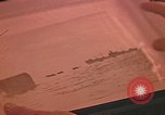 Image of Developing photographs in a dark room Pacific Theater, 1945, second 38 stock footage video 65675046450