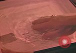 Image of Developing photographs in a dark room Pacific Theater, 1945, second 40 stock footage video 65675046450
