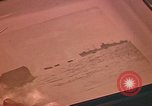 Image of Developing photographs in a dark room Pacific Theater, 1945, second 41 stock footage video 65675046450