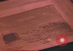 Image of Developing photographs in a dark room Pacific Theater, 1945, second 44 stock footage video 65675046450