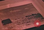 Image of Developing photographs in a dark room Pacific Theater, 1945, second 45 stock footage video 65675046450