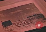 Image of Developing photographs in a dark room Pacific Theater, 1945, second 46 stock footage video 65675046450