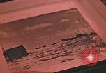 Image of Developing photographs in a dark room Pacific Theater, 1945, second 49 stock footage video 65675046450