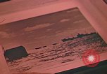 Image of Developing photographs in a dark room Pacific Theater, 1945, second 52 stock footage video 65675046450