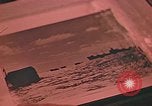 Image of Developing photographs in a dark room Pacific Theater, 1945, second 53 stock footage video 65675046450